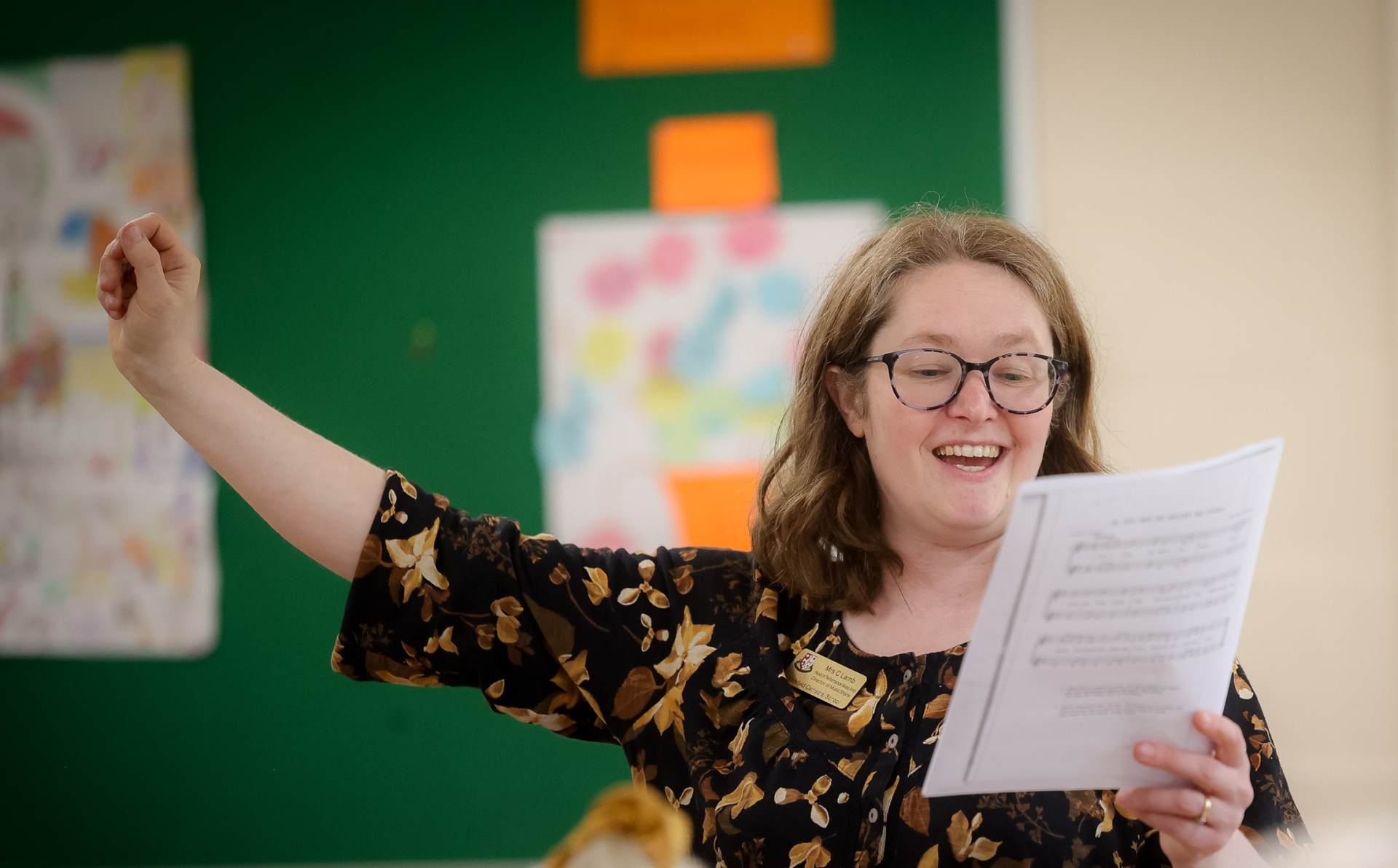 Cathy Lamb conducting a choir