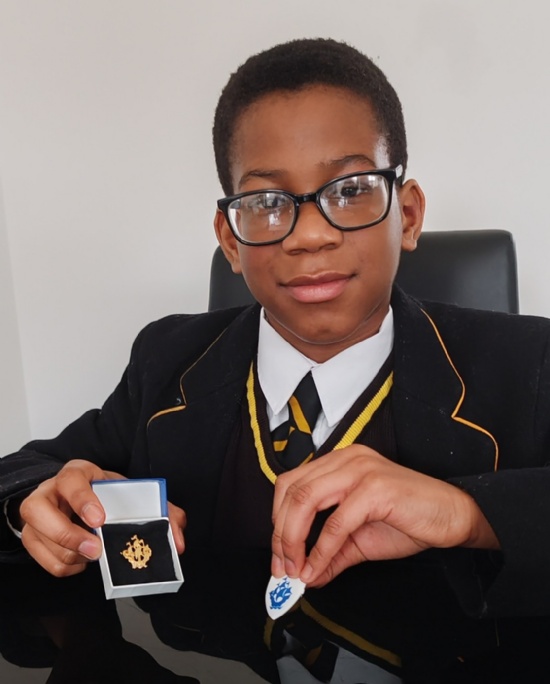 Jayce has a gold Blue Peter badge!